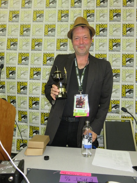 Shannon Wheeler holding Inkpot Award.JPG