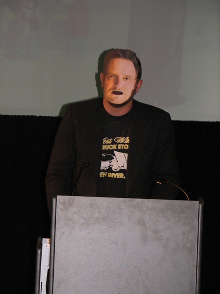 Andy B wearing a Cameron Stewart mask accepting an award for Cameron Stewart 1.JPG